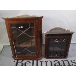 A mahogany hanging corner display cabinet, 69cm wide x 90cm high, together with a similar smaller,