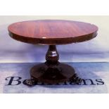 A 19th century rosewood circular tilt top table, 105cm wide x 80cm high.