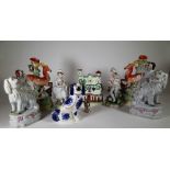 Ceramics, comprising; 19th century and later Staffordshire flatback figure groups and spill vases,