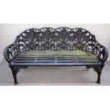 After Coalbrookdale; Lily of the Valley pattern, a black painted cast metal garden bench,