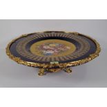 A 20th century Sevres style gilt metal mounted decorative plate.