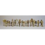 A collection of mid 20th century brass pipe tampers, mainly figural subjects. The tallest 7cm.
