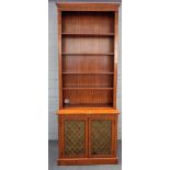 A 20th century floral polychrome painted satinwood bookcase/ cabinet,