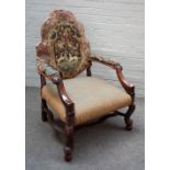 An early 18th century and later walnut framed hump back open armchair, on scroll supports,