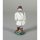 A small Russian porcelain figure of man, Popov factory, Moscow, 19th century,