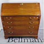 A 19th century mahogany bureau, 124cm wide.