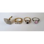 A 9ct gold and colourless gem set ring, detailed MUM,