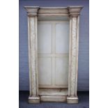 A pair of distressed white painted floor standing breakfront open bookcases, each on plinth base,