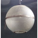 A pair of modern industrial moulded glass ceiling lanterns of globular form,