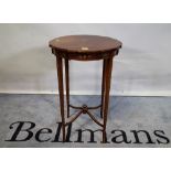 William T White; a late 19th century satinwood occasional table with painted floral decoration,