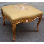 A Louis XV style gilt framed foot stool of square serpentine outline on shell capped cabriole
