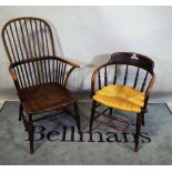 A late 18th century elm Windsor armchair and a late 19th century smokers chair, (2).