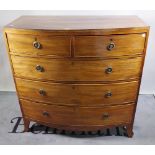 A 19th century mahogany bowfront chest of two short and three long drawers with splayed bracket