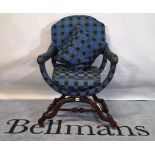 An 18th century style Continental walnut open armchair.