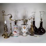A group of five pairs of 20th century decorative table lamps, including brass and ceramic examples,
