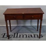 A Victorian mahogany two drawer side table on ring turned tapering supports, 100cm wide x 78cm high.