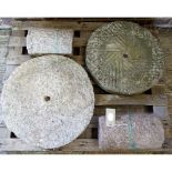 Two carved granite occasional tables, each with circular tops, on turned columns,
