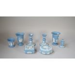 A group of Wedgwood blue jasper, 20th century, mostly sprigged with classical figures,