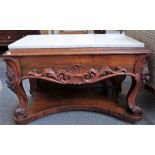 A 19th century low marble top console with carved mahogany single drawer base on scroll supports,