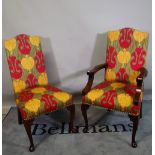 A set of ten 20th century upholstered highback dining chairs on cabriole suppports to include two