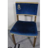 A reproduction Elizabeth II Coronation chair.