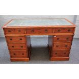 Heal & Son London; a 19th century mahogany pedestal desk with nine drawers about the knee,