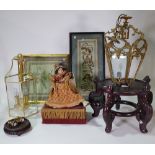 A group of collectables, comprising; a reproduction doll automaton, two Chinese wood stands,