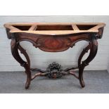 A 19th century continental walnut and kingwood serpentine console table base on four scroll