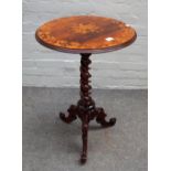 A Victorian marquetry inlaid rosewood circular tripod table on barleytwist column,