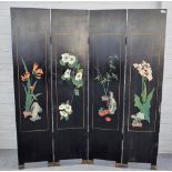 An Eastern lacquer four fold screen decorated with water birds in a lake scene,