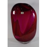 A Murano style glass vase, modern, decorated in mixed tones of red and blue, 54cm high.