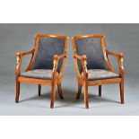 A pair of Empire Revival gilt metal mounted mahogany open armchairs,