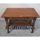 A late 19th century oak Arts & Crafts two tier side table with single drawer,