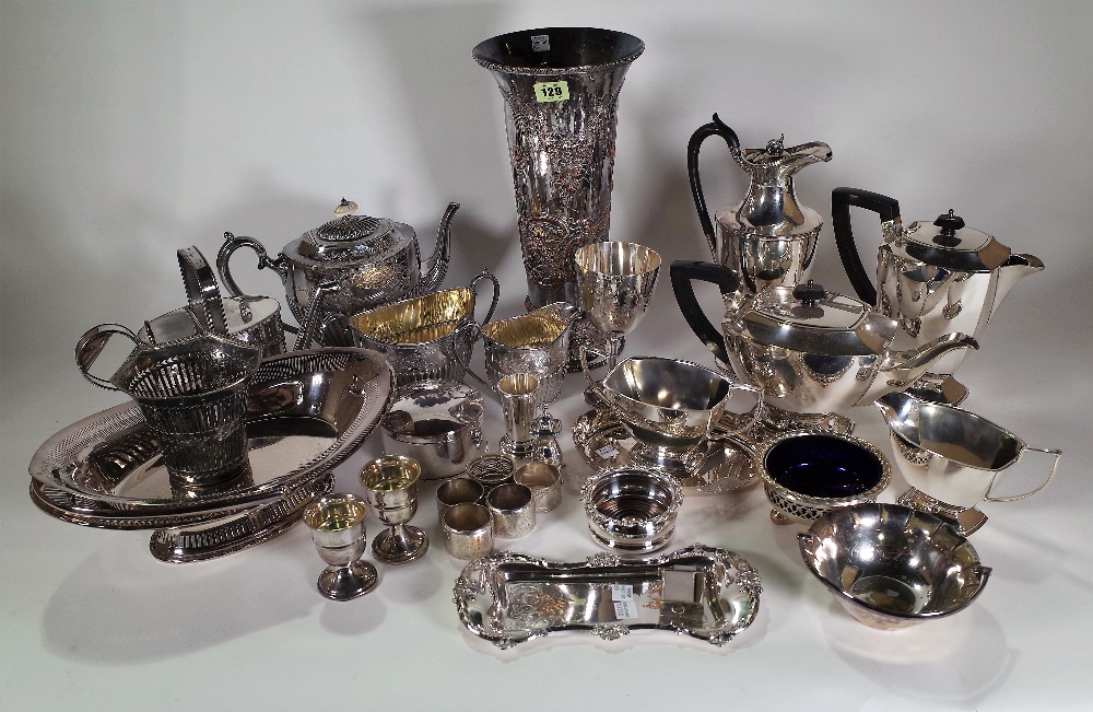 Silver plated wares, including; a vase of tapering form, tea pots, jugs, napkin rings and flatware,