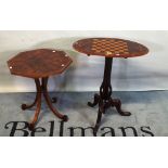 A Victorian walnut and inlaid oval games table on reeded column and three outswept supports and a