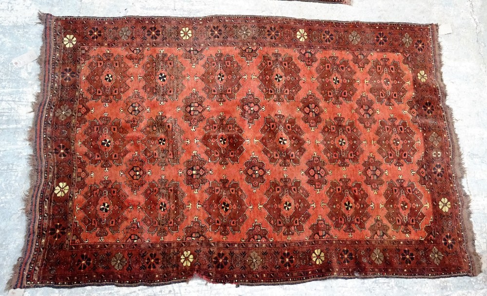 A Beshir rug, the madder field with six rows of three flowerhead guls, flowerhead border, - Image 2 of 6