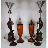 Lighting, comprising; 20th century, a pair of metal urn shaped lamps on octagonal plinth bases,