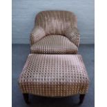 A 20th century tub back easy armchair, on turned supports, together with matching footstool,