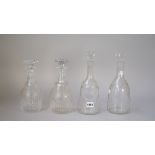 Two sugarloaf glass decanters and stoppers, one with a label engraved for `Port',