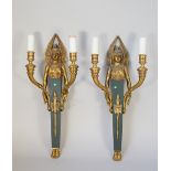 A pair of French Empire style figural two branch wall appliques, 20th century,