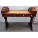 Maitland-Smith; a 20th century mahogany writing table,