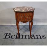 A 19th century French serpentine marble topped ormolu mounted two drawer side table on outswept
