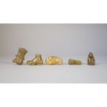 Five brass novelty vestas, early 20th century, comprising; a violin case, an elephant's head,