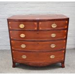 An early Victorian inlaid mahogany bowfront chest of two short and three long graduated drawers,