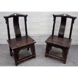A pair of 19th century Chinese child's yoke back chairs, on turned supports, 38cm wide x 73cm high.