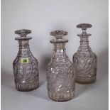 A set of three Regency cut glass decanters and stoppers, early 19th century,