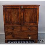 A 19th century mahogany squat linen press converted to a cabinet on bracket feet,