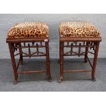 A pair of 20th century faux bamboo square stools on splayed supports, 44cm wide x 64cm high.
