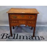 An early 18th Century oak lowboy, with crossbanded rectangular top with unusual inlay, 71cms high,