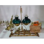 A Victorian brass and glass oil lamp converted to electricity,